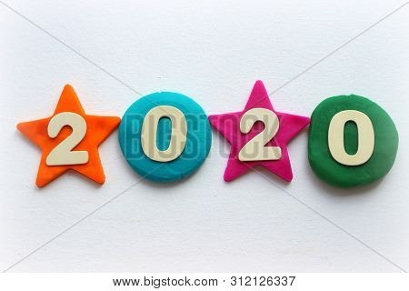 2020 Background .the Concept Of The New 2020. New Year With Colorful Numbers 2020 On White Backgroun