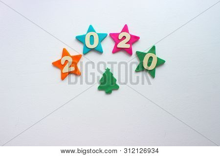 2020 Background .the Concept Of The New 2020. New Year With Colorful Numbers 2020 On White Backgroun
