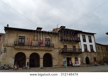 Main Facade Of The City Hall In The Don Borja Tower In The Mayor Square In Santillana Del Mar. Augus