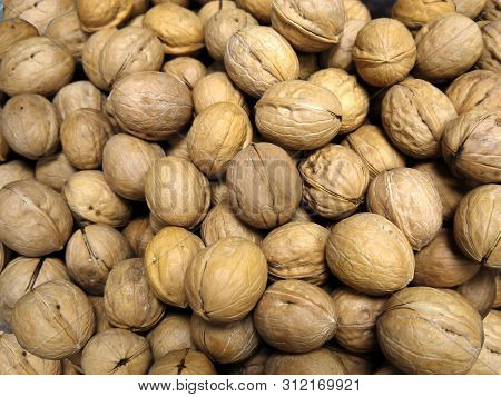 The Lots Of Inshell Walnuts Photographed From Close Range