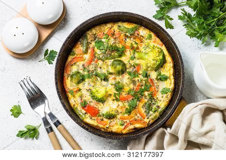 Frittata With Fresh Vegetables. Baked Omelette With Broccoli, Paprika, Brussels Sprouts, Green Beans