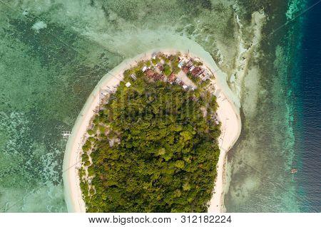 Round Tropical Island With White Sandy Beach, Top View. Mantigue Island, Philippines.small Inhabited