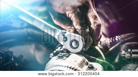 Auto Mechanic Working In Garage. Repair Service.