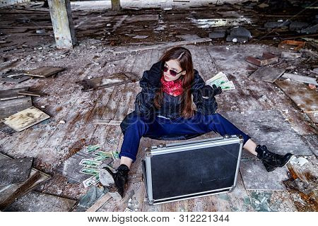 Girl In A Black Cloak With A Diplomat And Money In A Ruined Room. A Spy In A Secret Meeting. Unusual