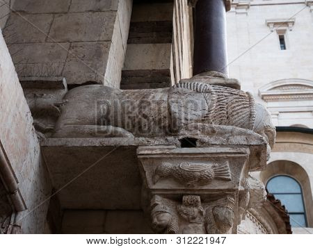 Cathedral Of Verona, External Romanesque Architecture With Bestiaries Carved In Marble
