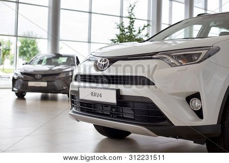 Russia, Izhevsk - July 18, 2019: New Cars In The Toyota Showroom. Modern Rav4. Famous World Brand.