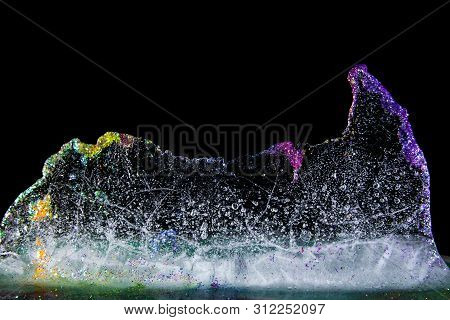 Colored Ice With Glitter, Melting. Multi Color Shining.