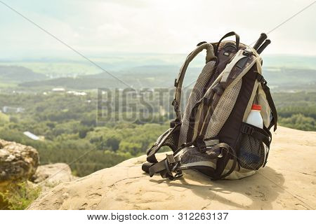 Hipster Hiker Tourist Backpack On Background Nature In Mountain, Blurred Panoramic Landscape, Travel