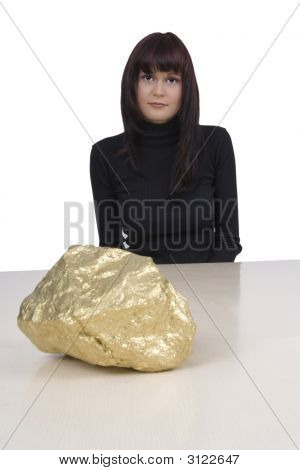 Woman With A Gold Nugget