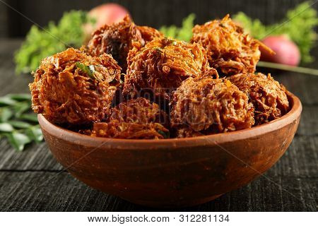 Bowl Of  Indian Snacks- Spicy Fried  Onion Fritters