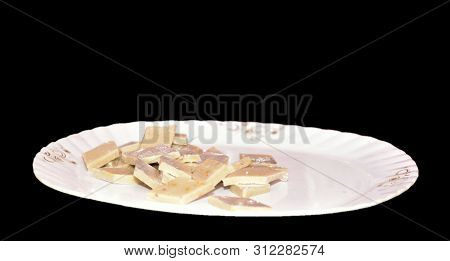 Kaju Katli Is A Diamond Shape Indian Sweet Made Using Cashew Sugar And Mava, Served In A Plate Over 