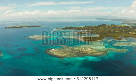 Seascape: Tropical Islands With Beaches And Azure Coral Reef Water From Above. Bucas Grande, Philipp