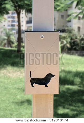 Metal Boxes With Free Bags For Collect Dogs Owners Dog Excrement. These Boxes Are Set By The City Mu