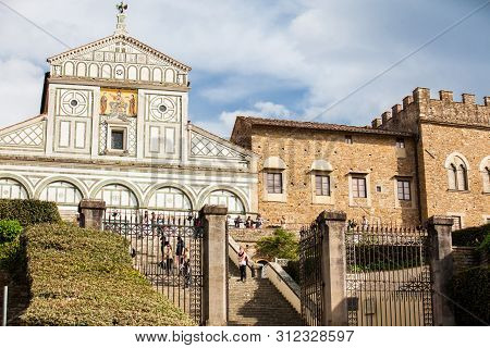 Florence, Italy - April, 2018: Tourists At The Basilica San Miniato Al Monte In Florence