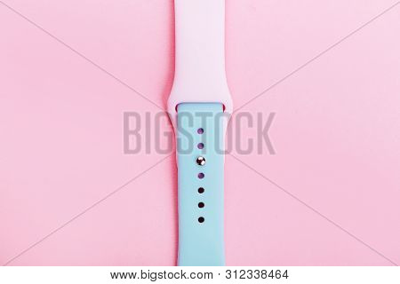 Watchband. Silicone Strap For Sports Watches. Color Bracelet For Smart Watches On Pink Background