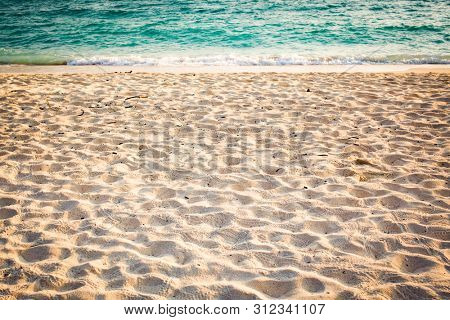 fine sand and clear blue water - beach background