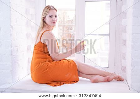 Pretty Plus Size Caucasian Woman Drink Wine In The Morning Alone At Home