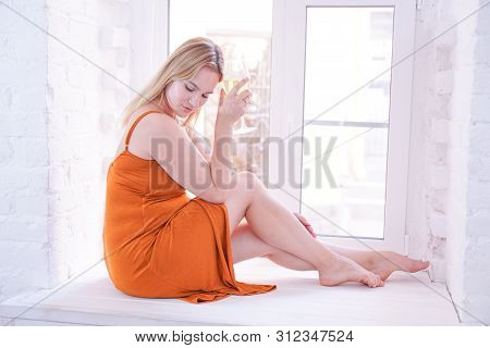 Pretty Plus Size Caucasian Woman Drink Wine In The Morning Alone At Home