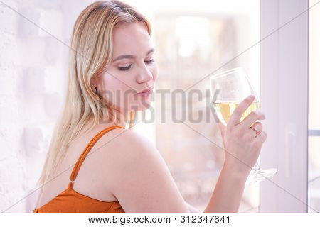 Pretty Plus Size Caucasian Woman Drink Wine In The Morning Alone At Home
