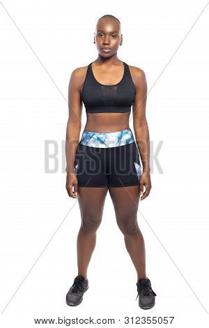 Athletic African American Black Female Wearing Workout Clothing.  Her Sporty Outfit Is A Sports Bra 