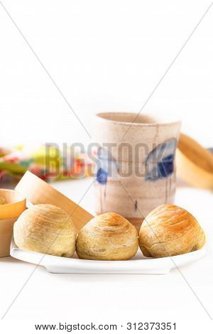 Oriental Food Concept Homemade Organic Huaiyang Spiral Chinese Flaky  Pastry Moon Cake On White Back