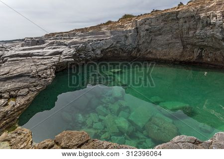 Seascape With Green Waters Of Giola Natural Pool In Thassos Island, East Macedonia And Thrace, Greec