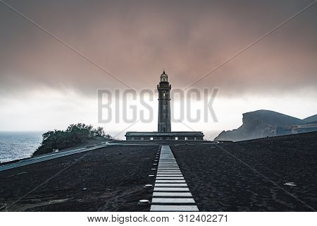 View Over Capelinhos Volcano, Lighthouse Of Ponta Dos Capelinhos On Western Coast On Faial Island, A