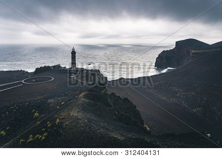 View Over Capelinhos Volcano, Lighthouse Of Ponta Dos Capelinhos On Western Coast On Faial Island, A