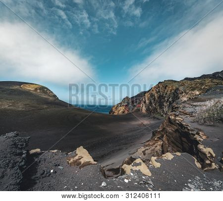 View Over Capelinhos Volcano, Lighthouse Of Ponta Dos Capelinhos On Western Coast On Faial Island, A
