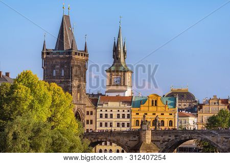 Prague Cityscape With Historic Landmark Of Charles Bridge With Crowd Of People. Czech Republic, Prag