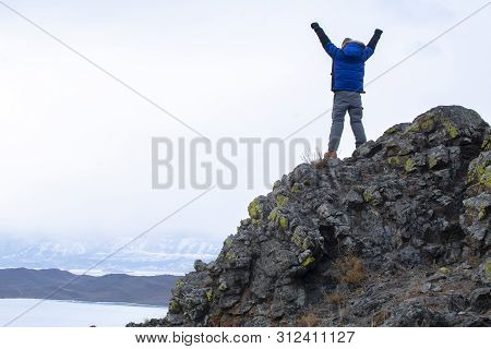 Man Put His Hands Up On Top Of Mountain, Lake Bikal In Russia