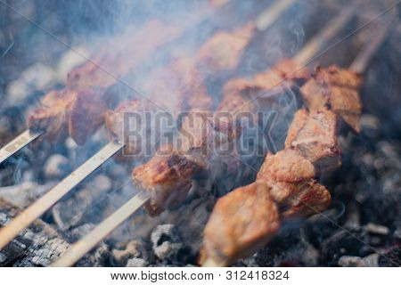 Grilled Shish Kebab On Skewer. Roasted Beef Meat Cooked At Barbecue. Traditional Eastern Dish Shashl