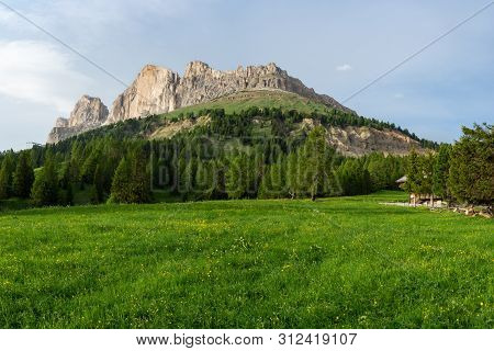 Passo Costalunga In Dolomites, Italy. Hillside Of Mount Catinaccio (rosengarten) On The Background.