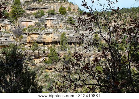 Native American Mountain Side Dwelling From Across The Canyon In Walnut Canyon National Monument In 