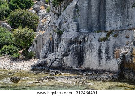 The Ruins Of The City Of Mira, Kekova, An Ancient Megalithic City Destroyed By An Earthquake.