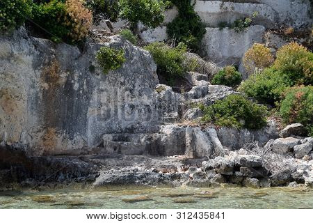 The Ruins Of The City Of Mira, Kekova, An Ancient Megalithic City Destroyed By An Earthquake.