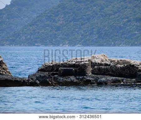 The Ruins Of The City Of Mira, Kekova, An Ancient Megalithic City Destroyed By An Earthquake.