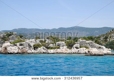 The Ruins Of The City Of Mira, Kekova, An Ancient Megalithic City Destroyed By An Earthquake.