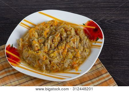 Stewed Cabbage With Carrot And Onion On Plate