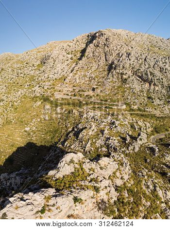 Panoramic Landscape. Hairpin Turn Road Between Rocky Mountains. Way To Sa Calobra Beach, Mallorca, B