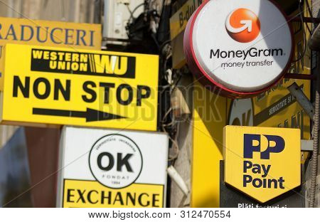 Bucharest, Romania - October 10, 2018: Several Western Union, Moneygram And Pay Point Commercials Ar