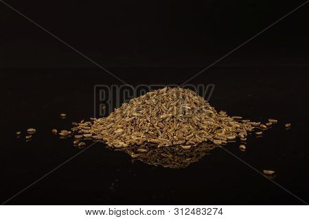 Lot Of Whole Dry Caraway Fruits Heap Isolated On Black Glass