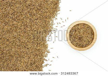 Lot Of Whole Dry Caraway Fruits In A Wooden Bowl Flatlay Isolated On White Background