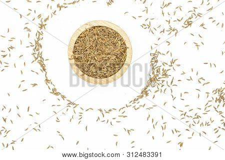 Lot Of Whole Dry Caraway Fruits In A Wooden Bowl Flatlay Isolated On White Background
