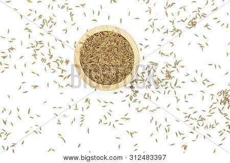 Lot Of Whole Dry Caraway Fruits In A Wooden Bowl Flatlay Isolated On White Background