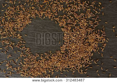 Lot Of Whole Dry Caraway Fruits Copyspace Circle Flatlay On Grey Stone
