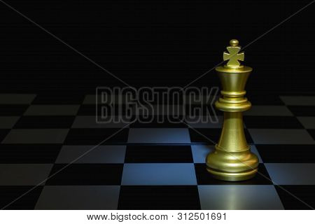 Chess Setup On Dark Background . Leader And Teamwork Concept For Success,chess King Alone On Board.