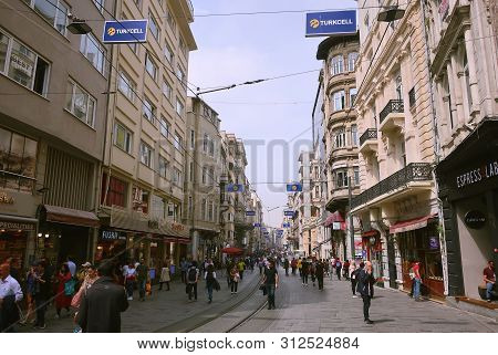 Istanbul, Turkey - May 15, 2019: Pedestrian Tourist Street Istiklal. Istiklal Street Is The Most Pop