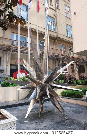Istanbul, Turkey - May 15, 2019: Pedestrian Tourist Street Istiklal. Star-shaped Design, Monument