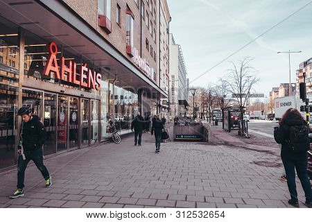 Editorial 28.03.2019 Stockholm Sweden People Walking On The Street Outside Ahlens And The Entrance T